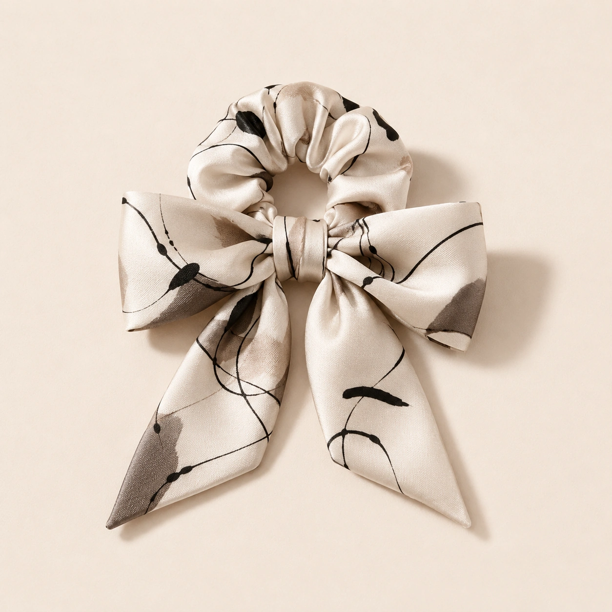 Silk Accessory 22 White silk scrunchie with black abstract line pattern and bow ribbon detail