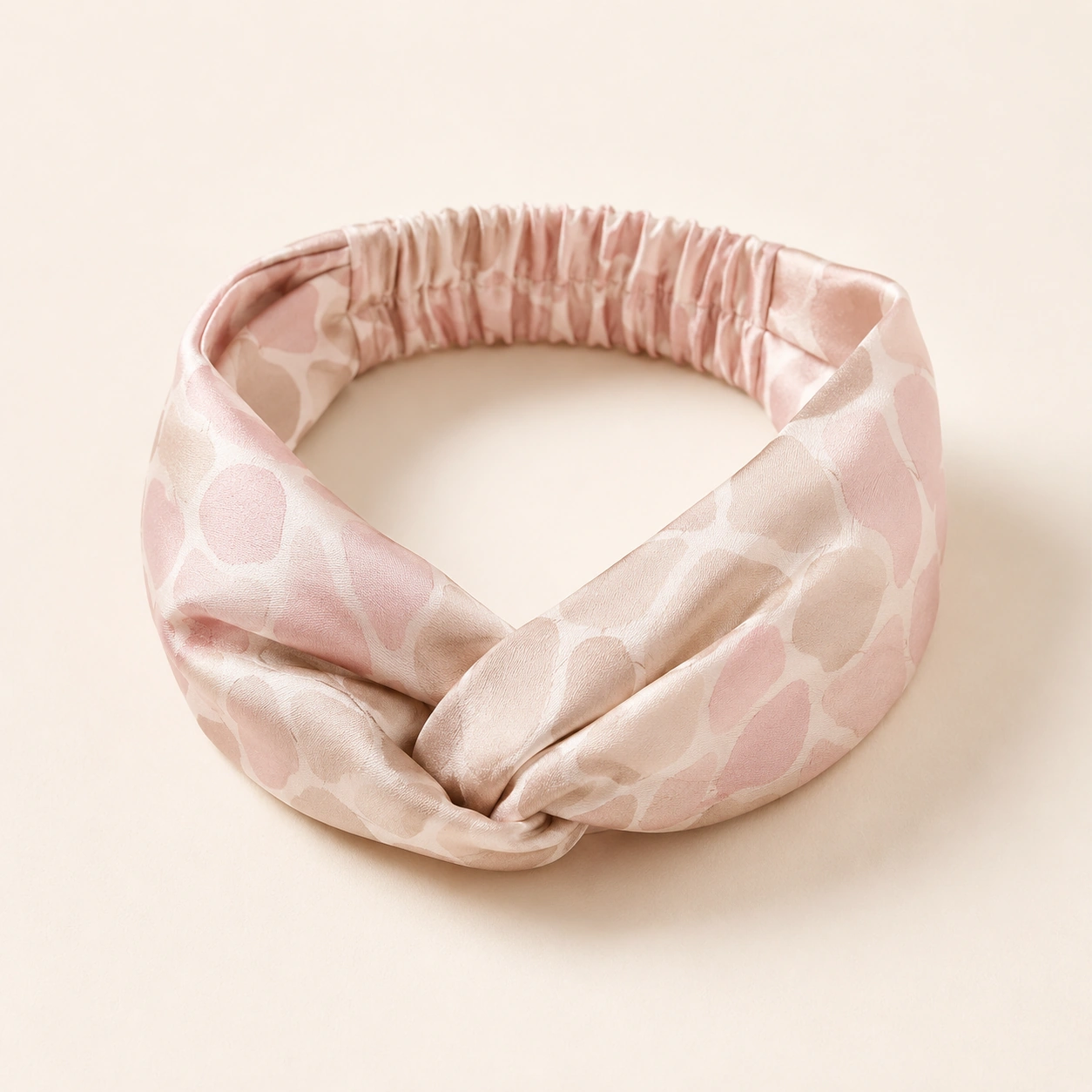 Silk Accessory 11 Soft pink abstract patterned silk elastic headband with twisted design