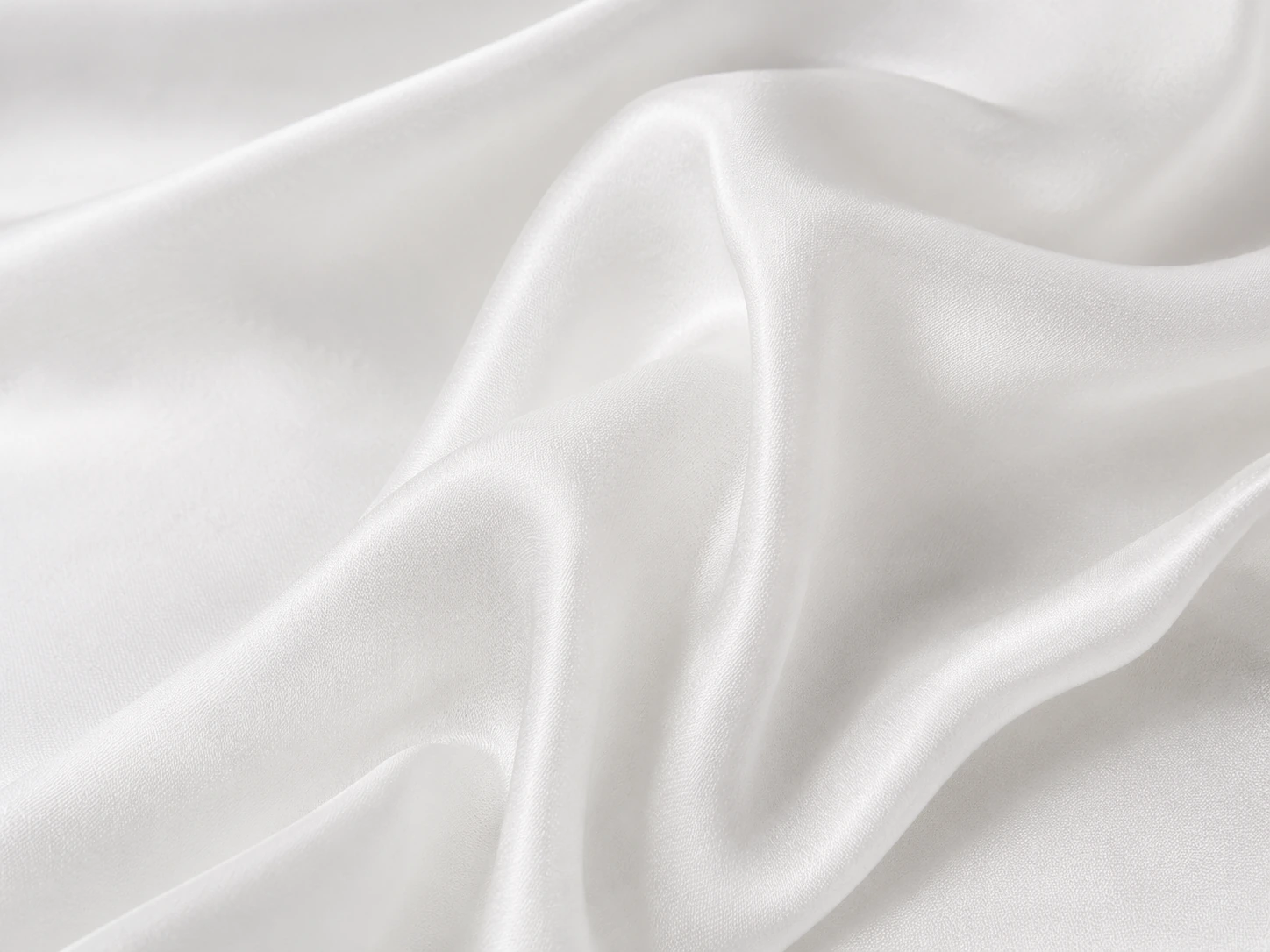 White silk georgette fabric closeup with textured surface and elegant folds