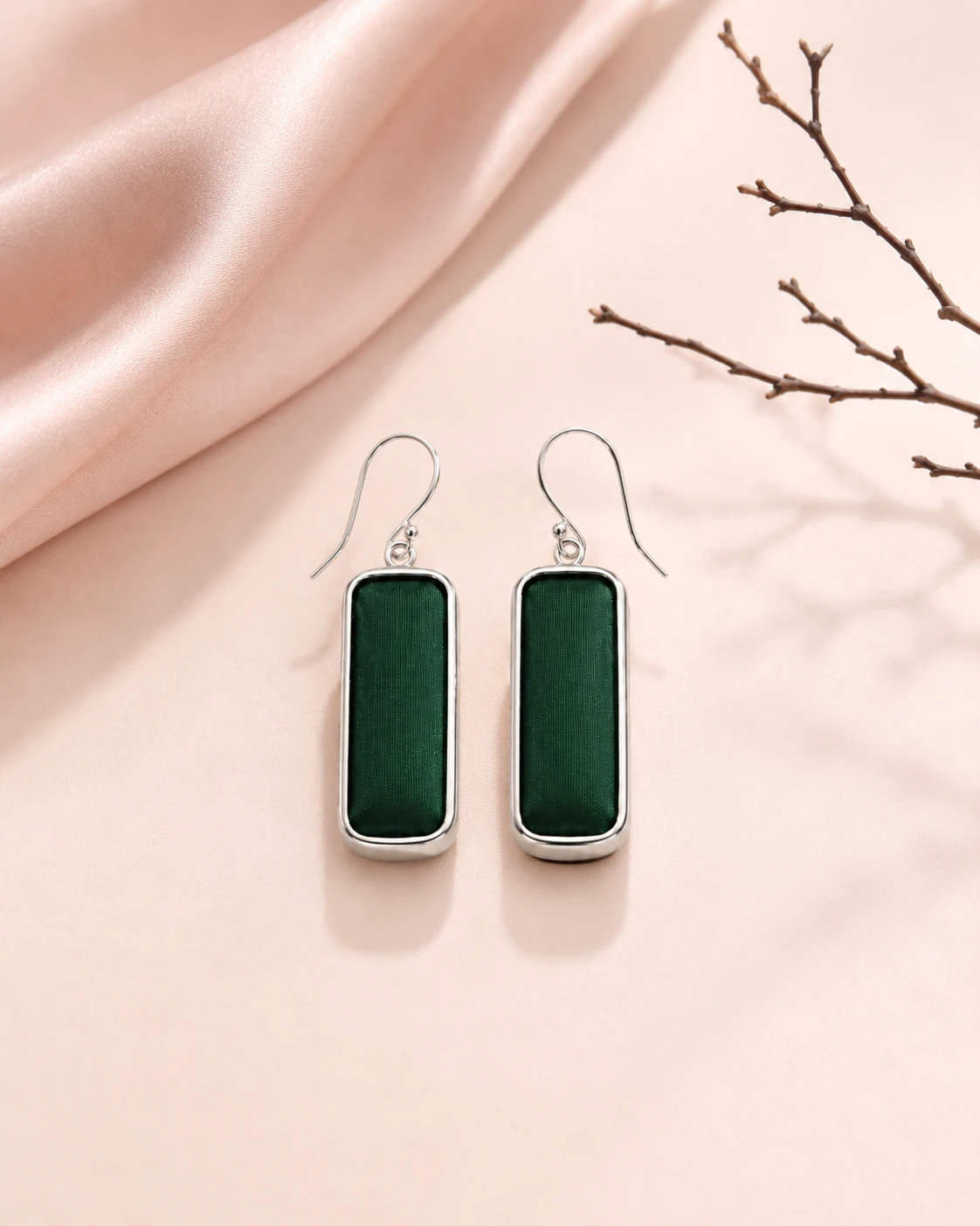 Rectangular drop earrings with solid dark green silk and smooth silver-tone frames