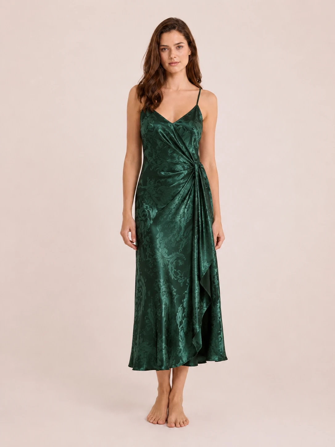 Burgundy halter neck silk gown with flowing skirt and luxury evening wear style